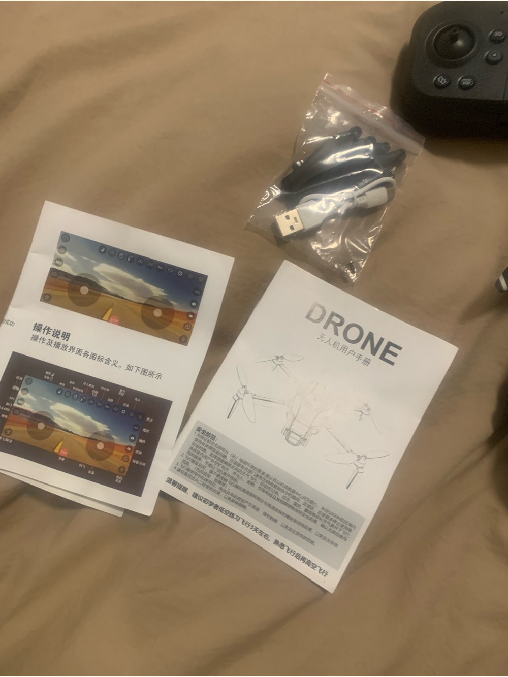 Black VR/Drone Controller with USB Cable and Spare Propellers